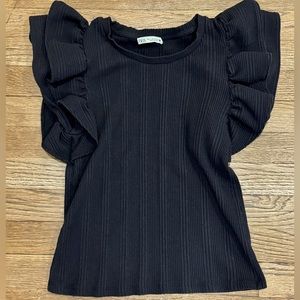 Size runs small! Black and cream